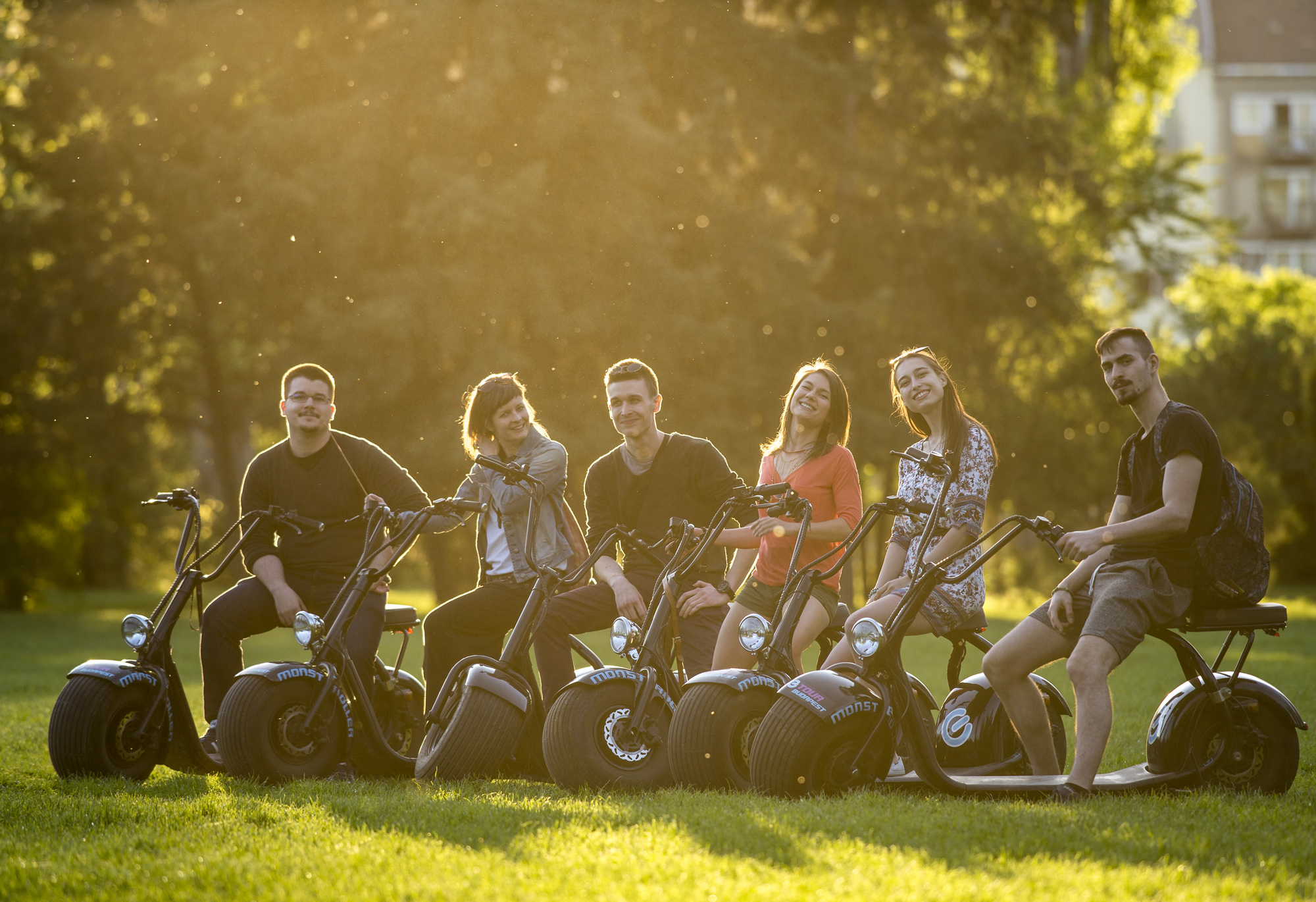  young group of people on MonsteRollers pose for a picture