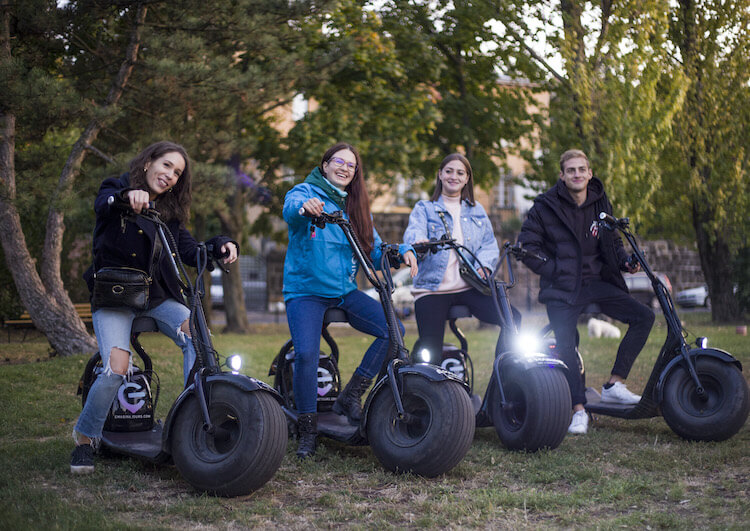 youngsters on escooter rented at E-Magine Tours